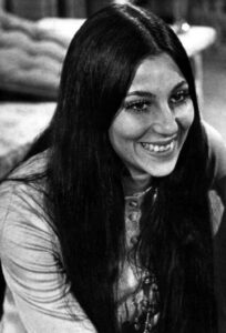 Cher center part hair
