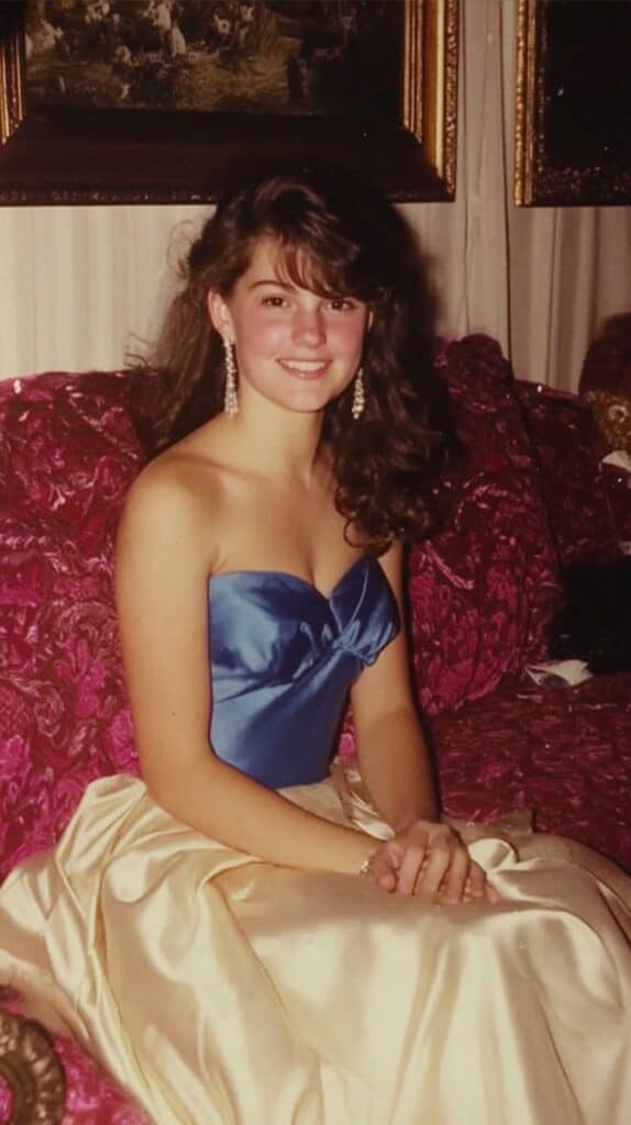 1980s high school girl in her prom dress